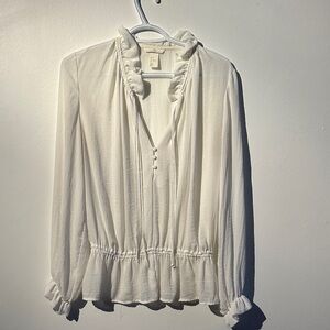 Elegant White Ruffled Blouse